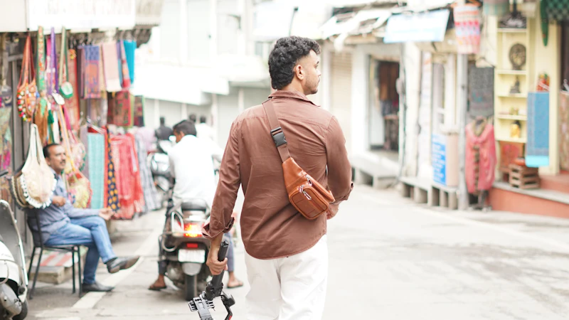 A person walking down a busy city street